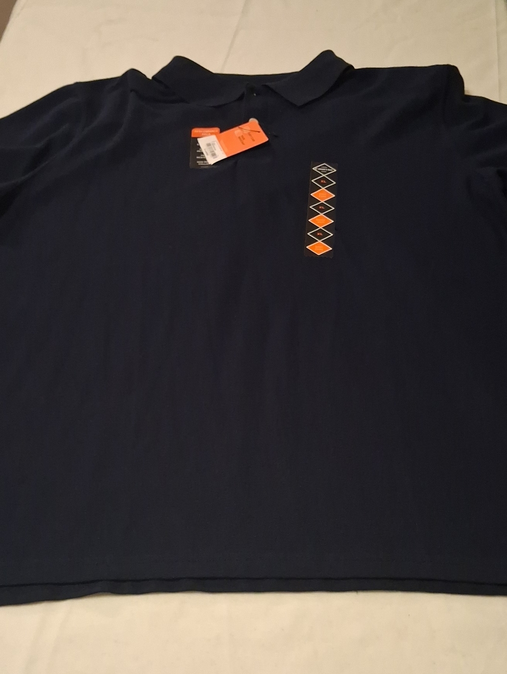 St. John's Bay Navy Polo with Orange Geometric Detail